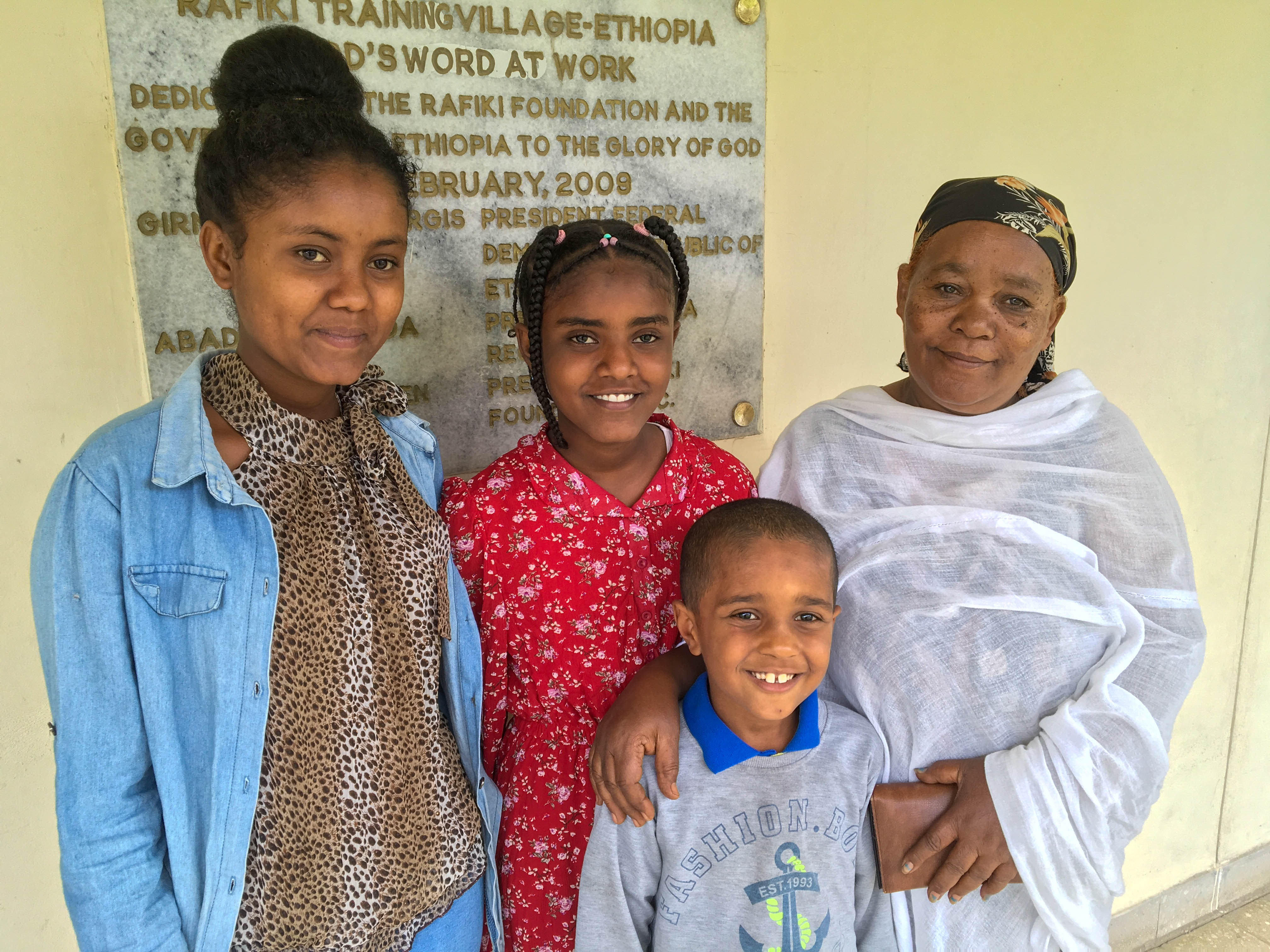 Meklit and Adonay with their cousin and grandmother